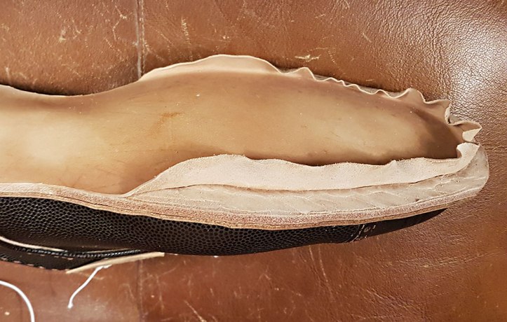 Channel opened for hand welting the outsole