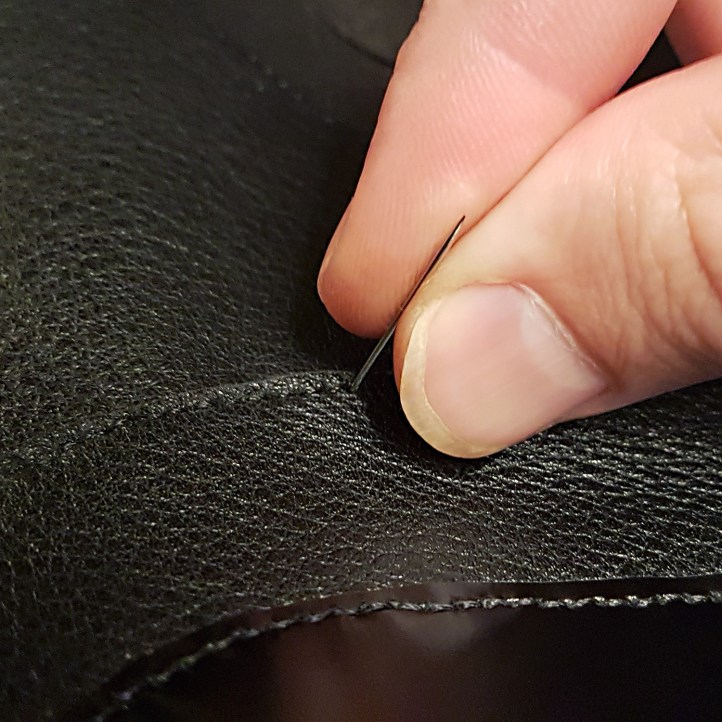 hand sewing leather.jpg