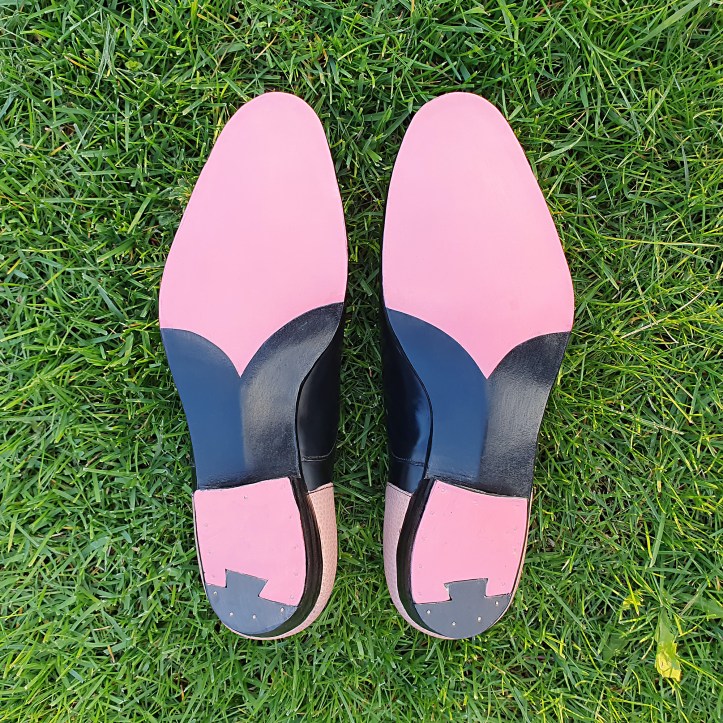 Pink outsoles grass